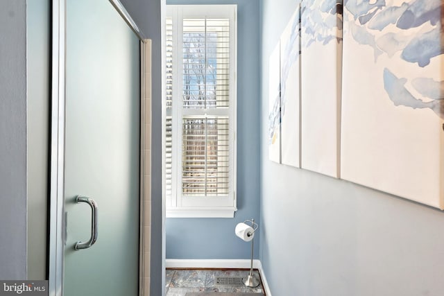 7951 Kelly Ann Ct, Fairfax Station, VA 22039 - bathroom with baseboards and a stall shower