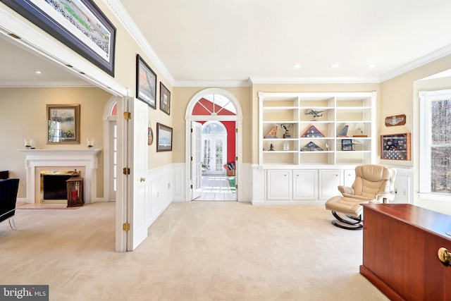 7951 Kelly Ann Ct, Fairfax Station, VA 22039 - sitting room featuring plenty of natural light, carpet floors, ornamental molding, a fireplace with flush hearth, and a wainscoted wall