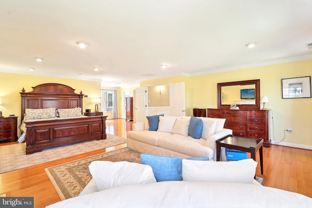 7951 Kelly Ann Ct, Fairfax Station, VA 22039 - bedroom featuring crown molding, light wood-type flooring, and baseboards