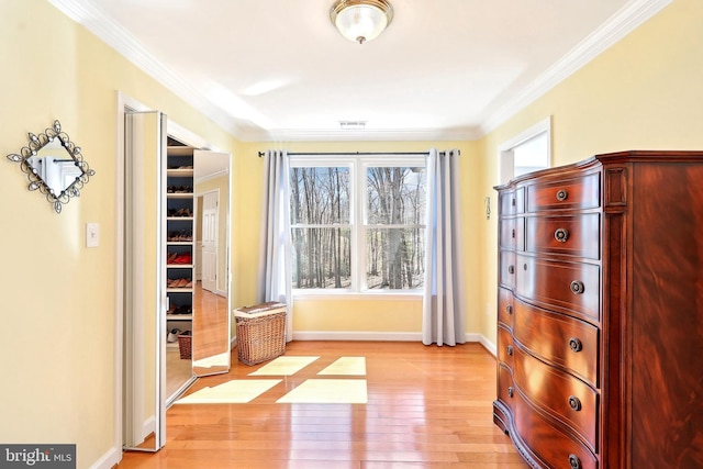 7951 Kelly Ann Ct, Fairfax Station, VA 22039 - bedroom with light wood-type flooring, ornamental molding, and baseboards