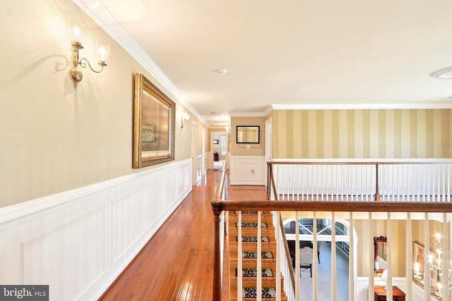 7951 Kelly Ann Ct, Fairfax Station, VA 22039 - corridor with ornamental molding, wood-type flooring, wainscoting, a decorative wall, and an upstairs landing