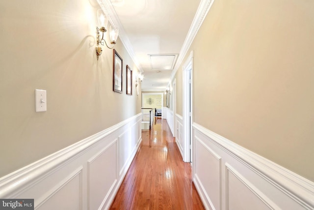 7951 Kelly Ann Ct, Fairfax Station, VA 22039 - corridor featuring a decorative wall, light wood-type flooring, wainscoting, and crown molding