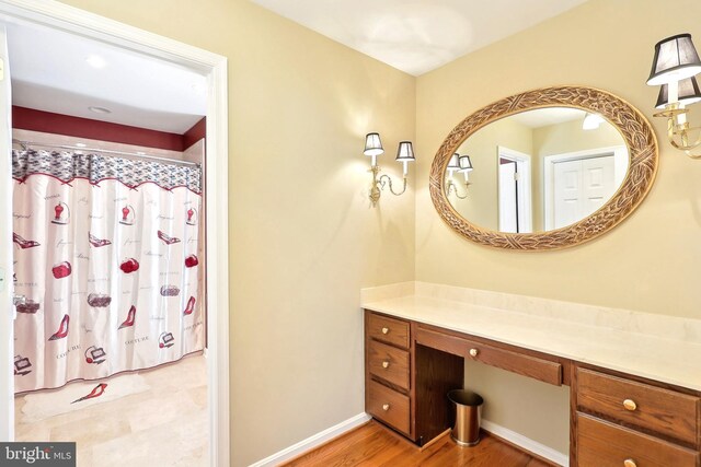 7951 Kelly Ann Ct, Fairfax Station, VA 22039 - full bath with vanity, baseboards, and wood finished floors