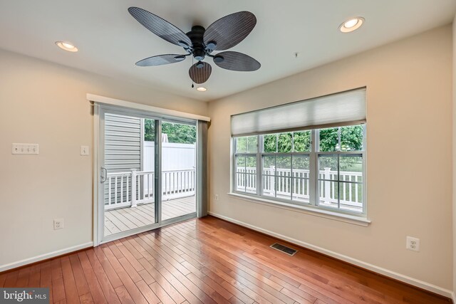 11606 Amaralles Dr, Reisterstown, MD 21136 - spare room featuring baseboards, a ceiling fan, hardwood / wood-style flooring, and recessed lighting
