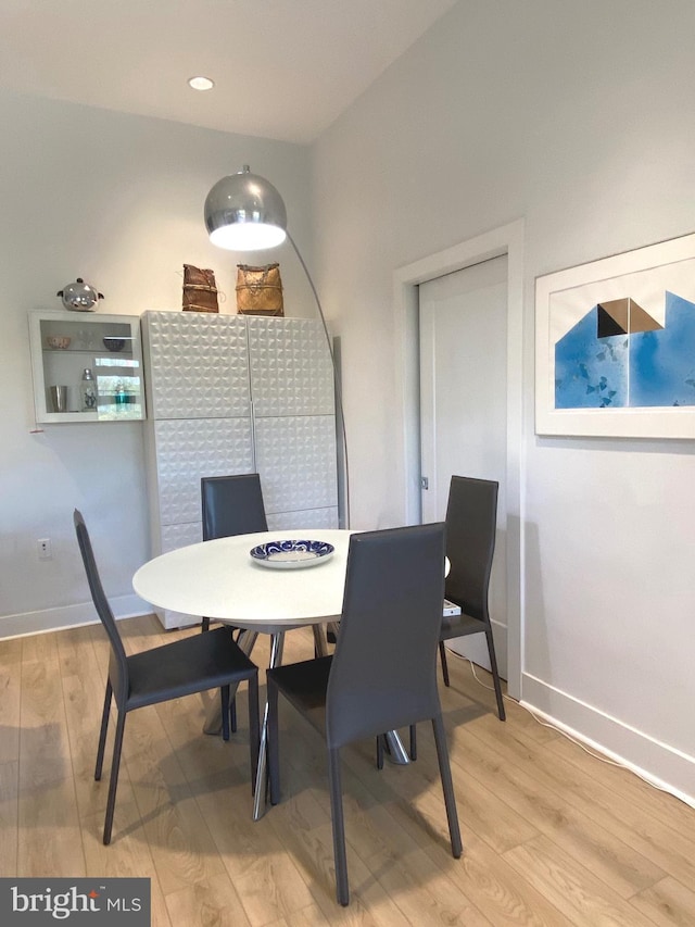 1111 Orren St NE Unit 300, Washington, DC 20002 - dining space with light wood-type flooring and baseboards