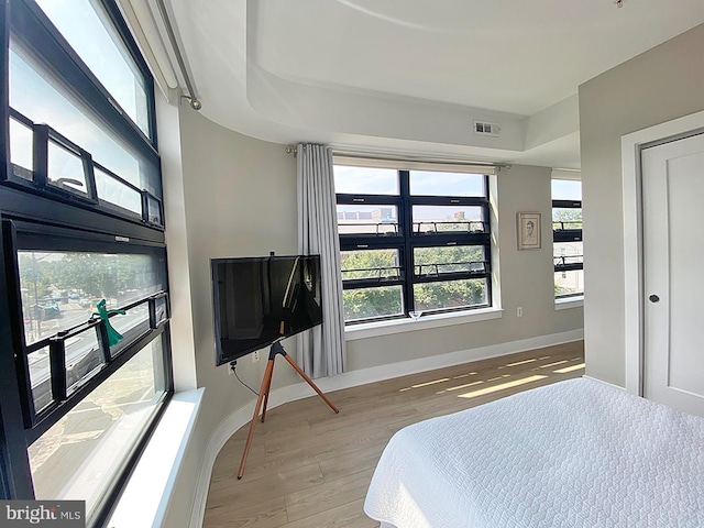 1111 Orren St NE Unit 300, Washington, DC 20002 - bedroom with wood finished floors and baseboards