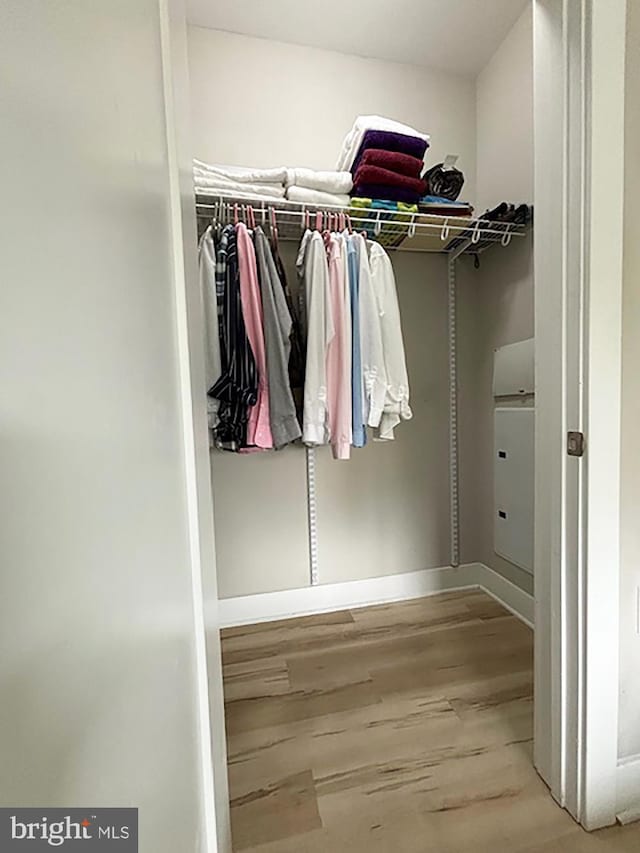 1111 Orren St NE Unit 300, Washington, DC 20002 - walk in closet featuring wood finished floors