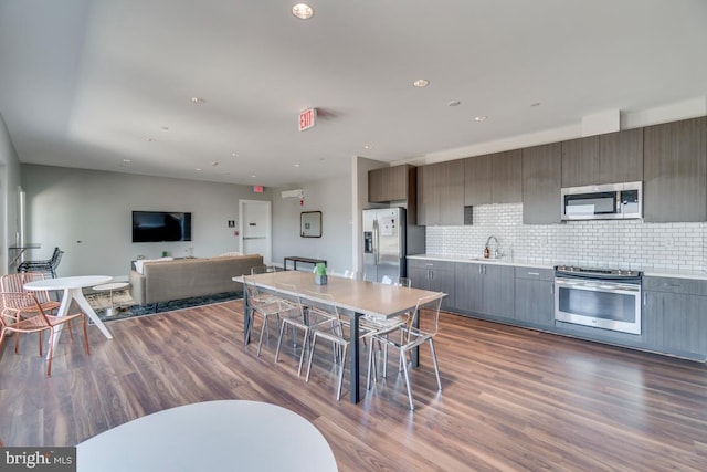 1111 Orren St NE Unit 300, Washington, DC 20002 - dining area featuring dark wood-type flooring and recessed lighting