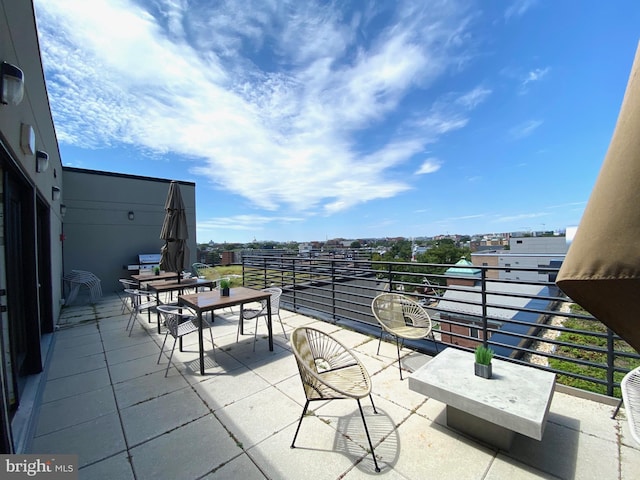 1111 Orren St NE Unit 300, Washington, DC 20002 - view of patio / terrace with a balcony and outdoor dining area