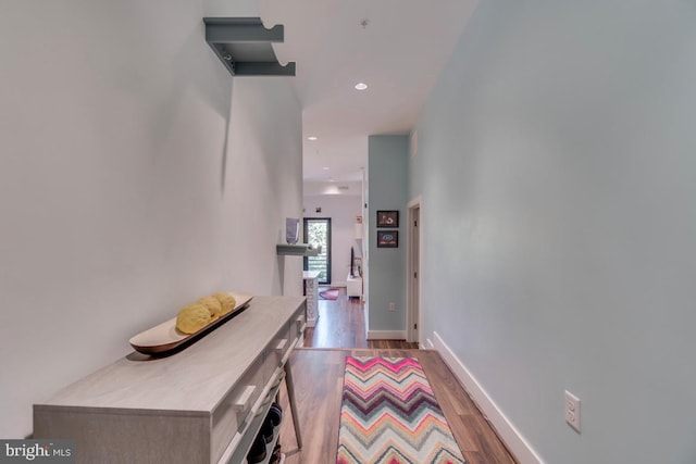 1111 Orren St NE Unit 300, Washington, DC 20002 - hallway with wood finished floors, baseboards, and recessed lighting