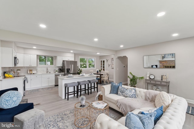 3015 Logan St, District Heights, MD 20747 - living area featuring recessed lighting, light wood-type flooring, and baseboards