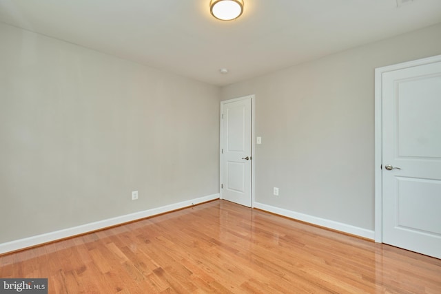 6823 Donahue Ct, Falls Church, VA 22042 - empty room with light wood-style flooring and baseboards