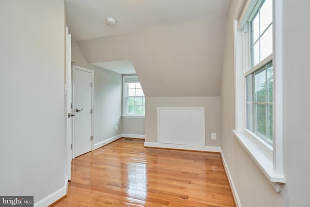 6823 Donahue Ct, Falls Church, VA 22042 - bonus room with vaulted ceiling, light wood finished floors, and baseboards