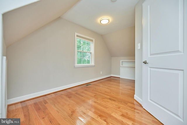 6823 Donahue Ct, Falls Church, VA 22042 - bonus room featuring light wood finished floors, baseboards, and lofted ceiling
