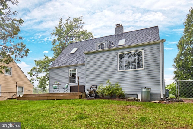 6823 Donahue Ct, Falls Church, VA 22042 - back of house featuring a chimney and roof with shingles