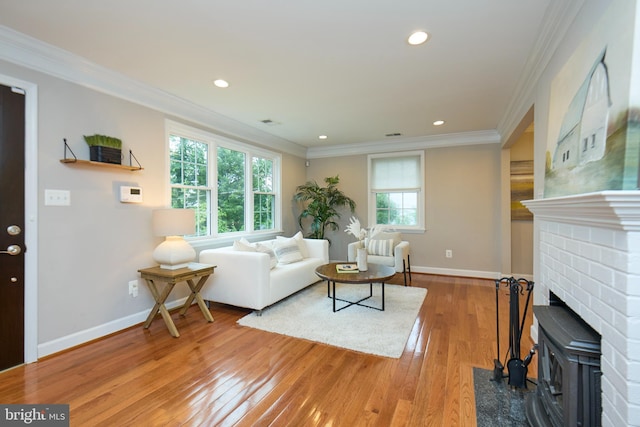 6823 Donahue Ct, Falls Church, VA 22042 - living area with plenty of natural light, ornamental molding, baseboards, wood finished floors, and recessed lighting
