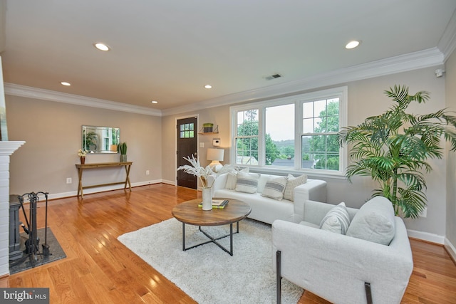 6823 Donahue Ct, Falls Church, VA 22042 - living room with crown molding, light wood-style flooring, recessed lighting, baseboards, and a fireplace
