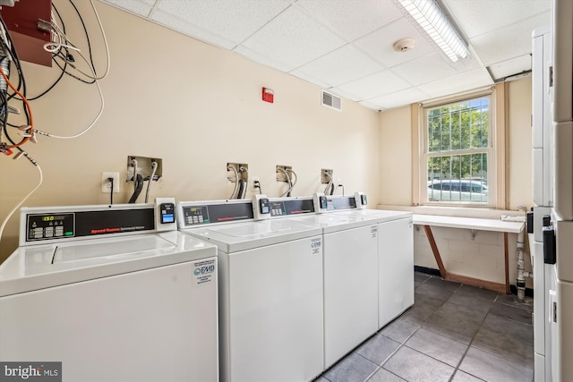 4402 1st Pl NE Unit 11, Washington, DC 20011 - community laundry room featuring washer and clothes dryer and light tile patterned floors