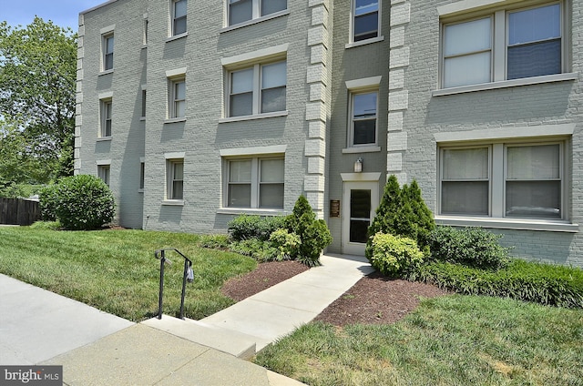 4402 1st Pl NE Unit 11, Washington, DC 20011 - view of front facade with brick siding and a front yard