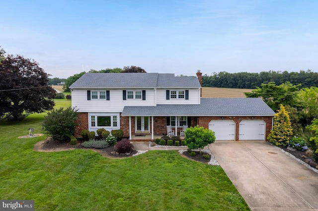 347 Paulsboro Rd, Woolwich Twp, NJ 08085 - traditional-style house featuring a garage, brick siding, a front lawn, concrete driveway, and a chimney