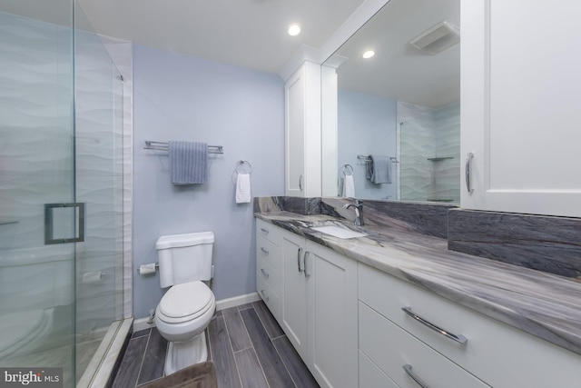 347 Paulsboro Rd, Woolwich Twp, NJ 08085 - bathroom with vanity, a shower stall, recessed lighting, and wood finish floors