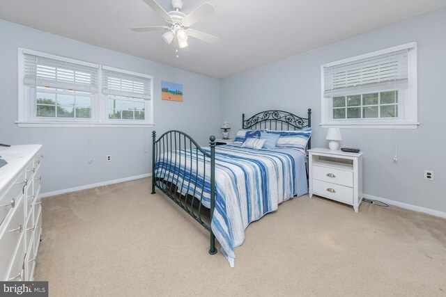 347 Paulsboro Rd, Woolwich Twp, NJ 08085 - bedroom with light colored carpet, multiple windows, and ceiling fan
