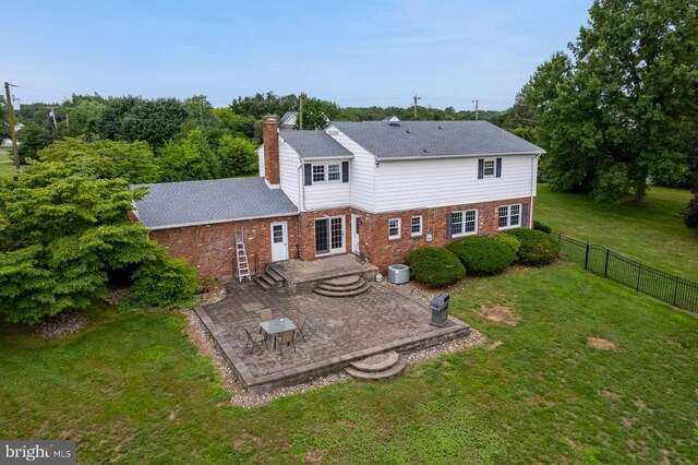 347 Paulsboro Rd, Woolwich Twp, NJ 08085 - rear view of property with brick siding, a patio area, a chimney, and a shingled roof