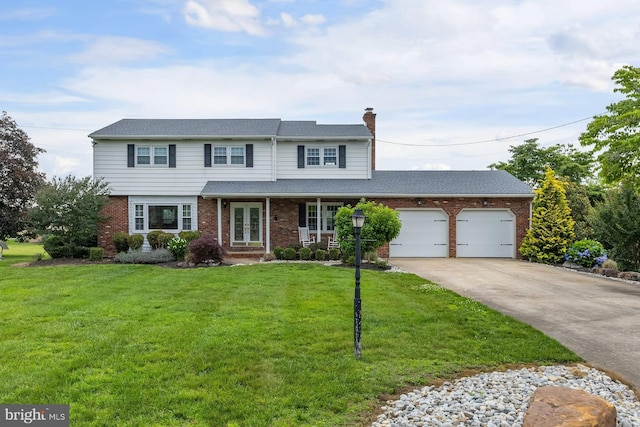347 Paulsboro Rd, Woolwich Twp, NJ 08085 - traditional home featuring french doors, an attached garage, brick siding, and a front yard