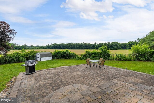347 Paulsboro Rd, Woolwich Twp, NJ 08085 - view of patio featuring a storage unit, area for grilling, and outdoor dining area