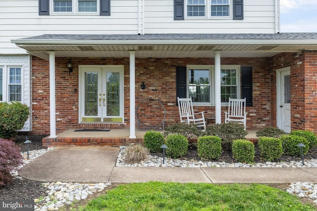 347 Paulsboro Rd, Woolwich Twp, NJ 08085 - view of exterior entry with a porch, french doors, and brick siding