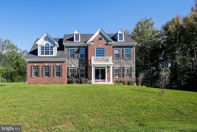 15491 Barnesville Rd, Boyds, MD 20841 - georgian-style home featuring brick siding, a front yard, and a balcony