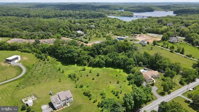 15491 Barnesville Rd, Boyds, MD 20841 - drone / aerial view of a large body of water and a heavily wooded area