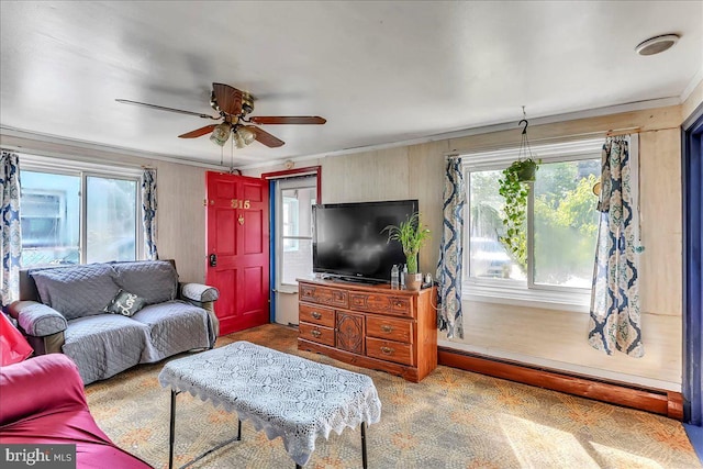 315 Mcginn Pl, New Castle, DE 19720 - living area featuring crown molding, ceiling fan, and a baseboard radiator