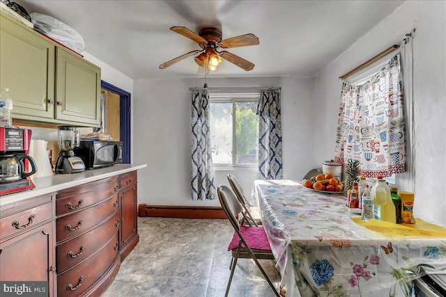 315 Mcginn Pl, New Castle, DE 19720 - dining area featuring ceiling fan and baseboards