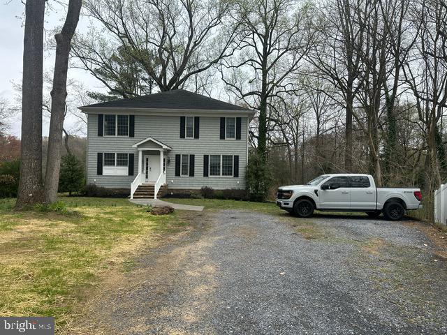27 Kleis Rd, Severna Park, MD 21146 - colonial home with gravel driveway