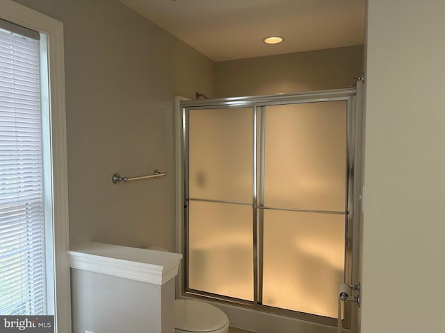 27 Kleis Rd, Severna Park, MD 21146 - bathroom featuring a shower with shower door and toilet