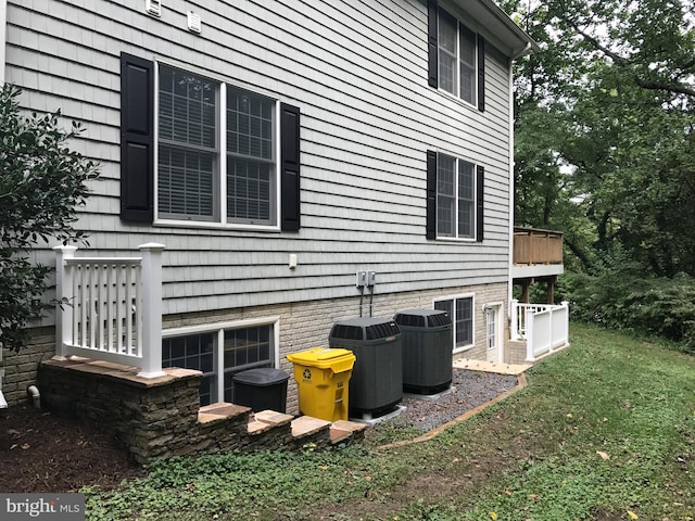27 Kleis Rd, Severna Park, MD 21146 - view of side of property with cooling unit and a yard