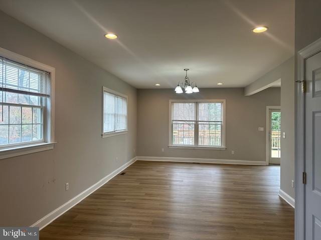 27 Kleis Rd, Severna Park, MD 21146 - unfurnished room with a chandelier, dark wood-type flooring, baseboards, and recessed lighting