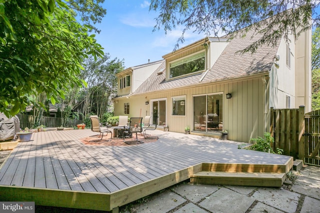 11212 Angus Pl, Potomac, MD 20854 - back of house featuring a shingled roof and a deck