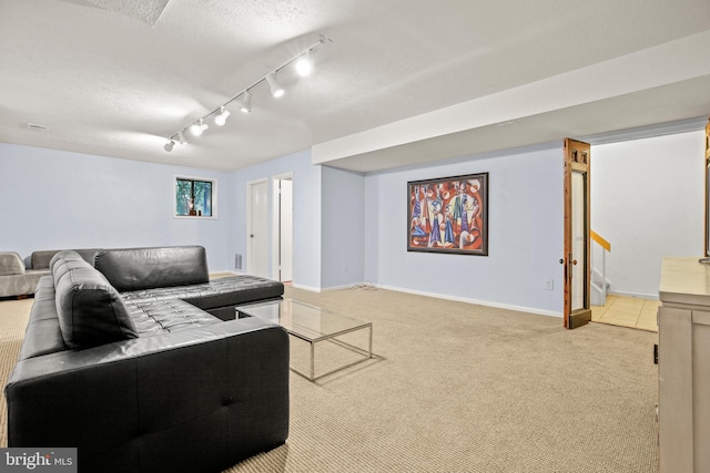 11212 Angus Pl, Potomac, MD 20854 - carpeted living room with rail lighting, baseboards, stairs, and a textured ceiling