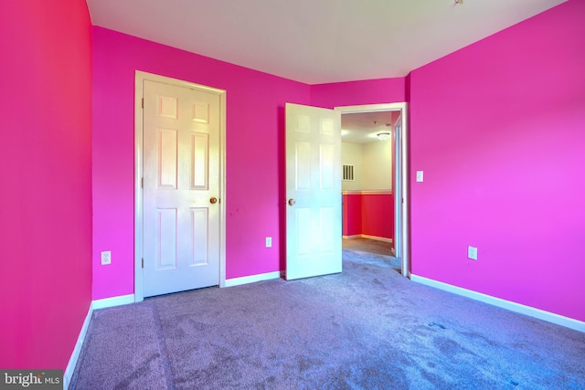 1713 Sea Pine Cir, Severn, MD 21144 - unfurnished bedroom featuring baseboards and carpet