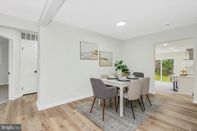 5507 Heatherwood Rd, Baltimore, MD 21227 - dining area featuring light wood-style floors, baseboards, and recessed lighting