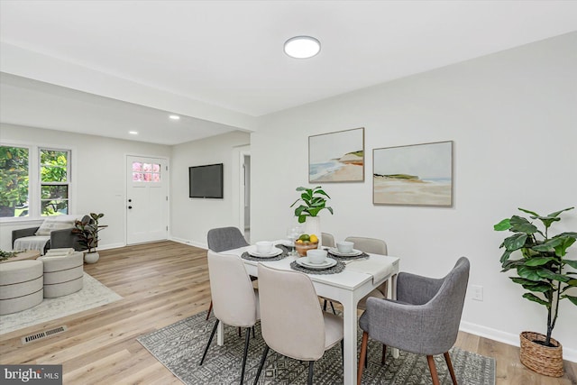 5507 Heatherwood Rd, Baltimore, MD 21227 - dining space featuring light wood finished floors, baseboards, and recessed lighting
