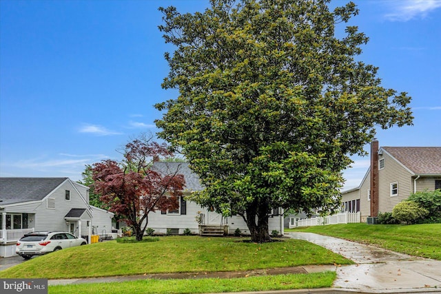 5507 Heatherwood Rd, Baltimore, MD 21227 - obstructed view of property featuring a front yard and entry steps