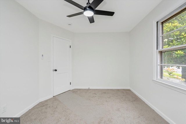 5507 Heatherwood Rd, Baltimore, MD 21227 - carpeted empty room featuring baseboards and a ceiling fan