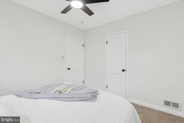 5507 Heatherwood Rd, Baltimore, MD 21227 - carpeted bedroom featuring baseboards and a ceiling fan