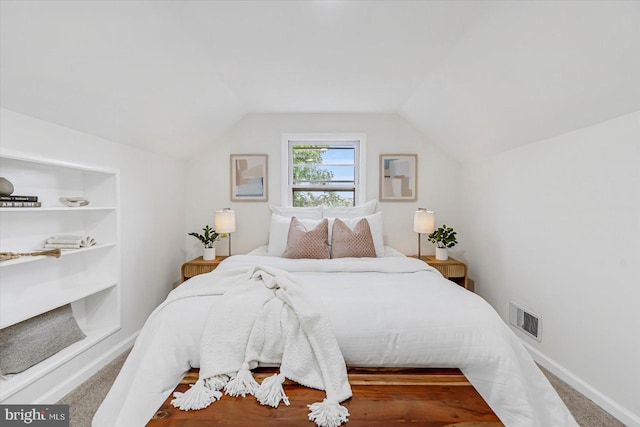 5507 Heatherwood Rd, Baltimore, MD 21227 - bedroom featuring lofted ceiling and baseboards