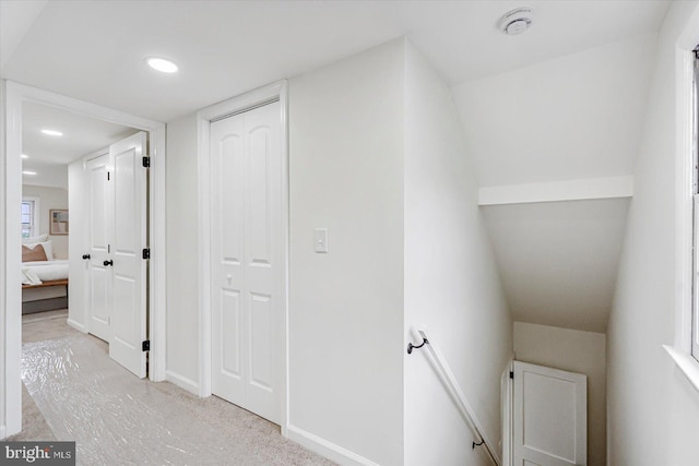 5507 Heatherwood Rd, Baltimore, MD 21227 - hall with an upstairs landing, baseboards, and recessed lighting