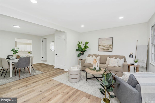 5507 Heatherwood Rd, Baltimore, MD 21227 - living room featuring wood finished floors, recessed lighting, and baseboards