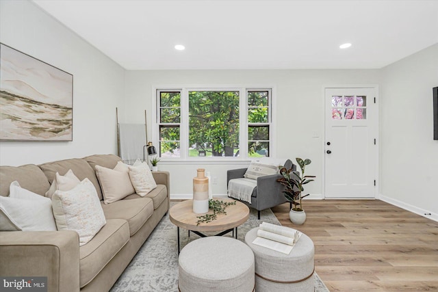 5507 Heatherwood Rd, Baltimore, MD 21227 - living area featuring light wood-style floors, baseboards, and recessed lighting